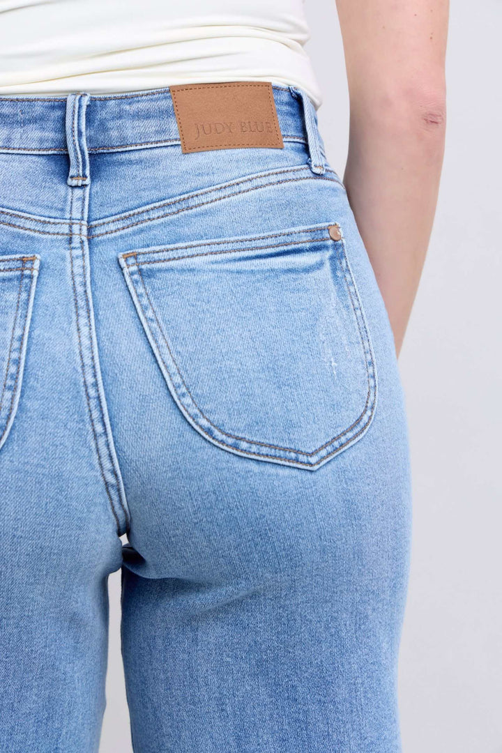 Judy Blue Wide Leg Jeans with PocketsWide Leg Jeans with Pockets are a trendy and versatile option for those looking to make a statement with their outfit. The wide-leg silhouette offers a relaxed and vWide Leg JeansJudy Blue Wide Leg Jeans