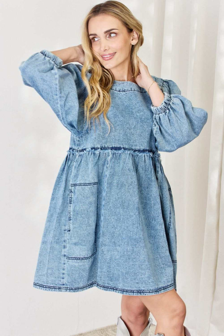 Oversized Denim Babydoll DressThis dress boasts a relaxed, oversized fit that flatters all body types. The babydoll silhouette adds a touch of playful femininity, while the balloon sleeves exude Mini DressesOversized Denim Babydoll Dress