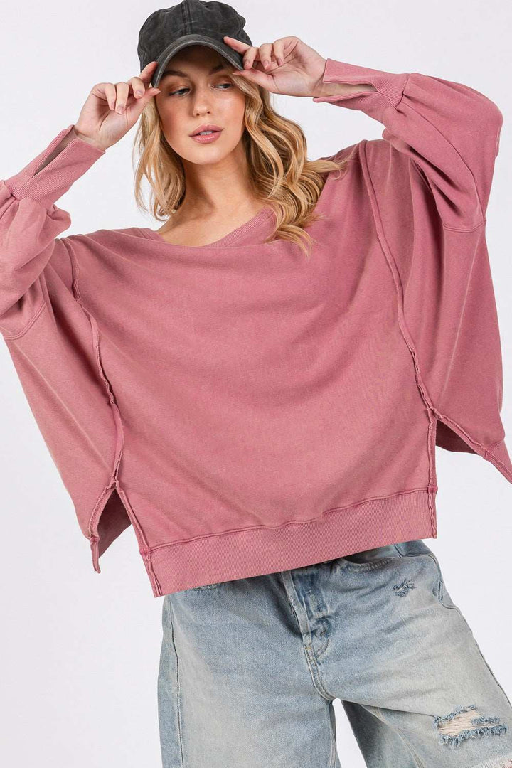 Cotton Mineral Wash Side Slit Oversized SweatshirtThe 100% cotton Mineral Wash Side Slit Oversized Sweatshirt is a comfortable and stylish choice for casual wear. Made from a soft fabrication, this sweatshirt offersSweatshirtsCotton Mineral Wash