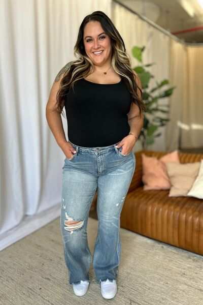 Judy Blue Medium Rise Tummy Control Destroyed FlareThe medium rise tummy control destroy flare jeans are designed to enhance your silhouette while providing ultimate comfort. Featuring a flattering fit, these jeans oFlare JeansJudy Blue Medium Rise