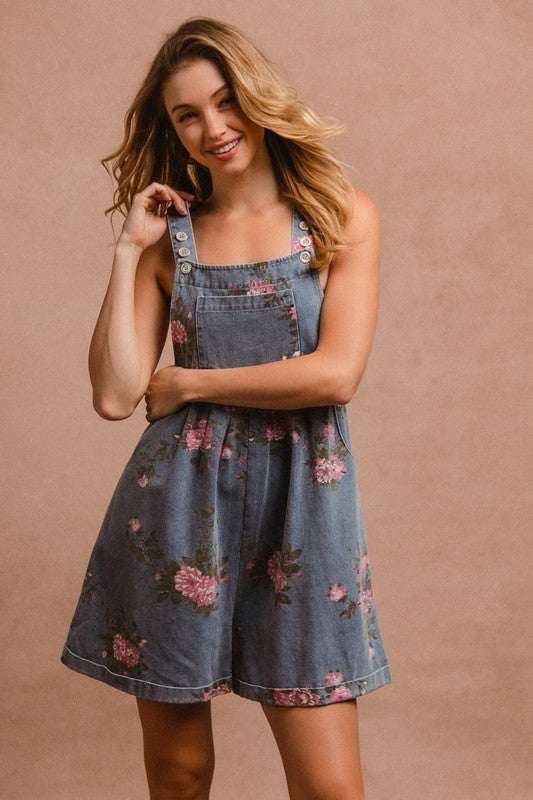 Heirloom Floral OverallsTimeless and effortlessly charming, The Heirloom Floral Overalls blend vintage elegance with casual ease. Crafted from sturdy yet soft cotton denim, these overalls fOverallsHeirloom Floral Overalls