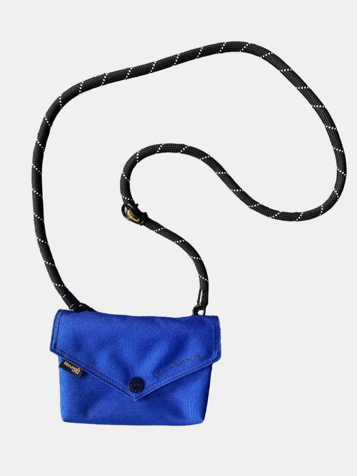 Himawari Solid Color Envelope Shape Crossbody Bag with Removable StrapThe solid color envelope shape crossbody bag with removable strap is a versatile and stylish accessory for any outfit. Its sleek design and solid color make it efforCrossbody BagsHimawari Solid Color Envelope
