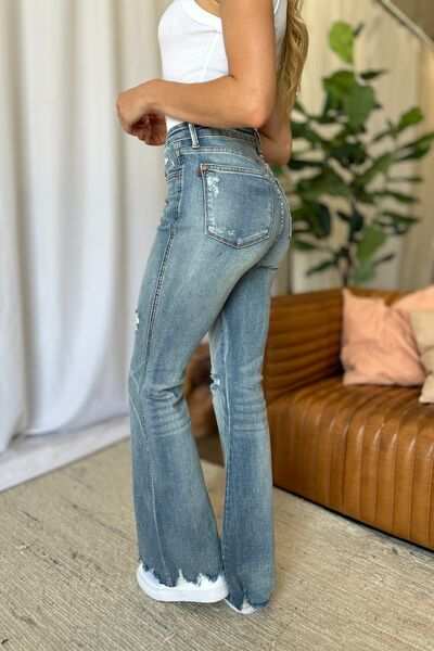 Judy Blue Medium Rise Tummy Control Destroyed FlareThe medium rise tummy control destroy flare jeans are designed to enhance your silhouette while providing ultimate comfort. Featuring a flattering fit, these jeans oFlare JeansJudy Blue Medium Rise