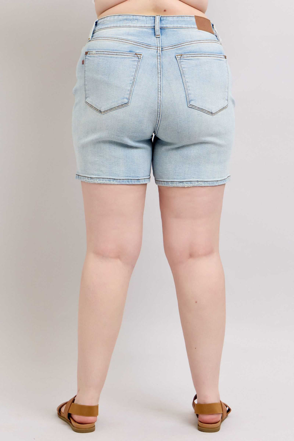 Judy Blue Two Button Denim ShortsThese 2-button denim shorts are a stylish addition to your wardrobe. They feature pockets for your convenience and added functionality. Made from durable denim fabriJean ShortsJudy Blue Two Button Denim Shorts