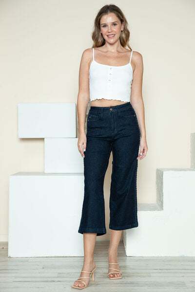 Judy Blue Side Seam Braid Detail Crop Wide Leg JeansThe High Rise side seam braid detail crop wide leg jeans offer a contemporary twist on classic denim. Featuring a unique braided detail along the side seams, these jCropped JeansJudy Blue Side Seam