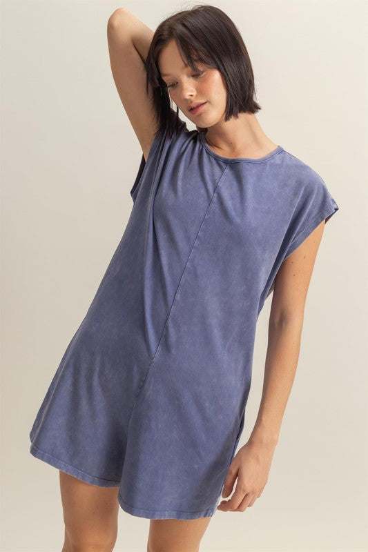 Relaxed Fit Breezy RomperThe Round Neck Cap Sleeve Relaxed Fit Breezy Romper is a stylish and comfortable one-piece outfit perfect for warm weather. Featuring a round neck and cap sleeves, tRompersRelaxed Fit Breezy Romper