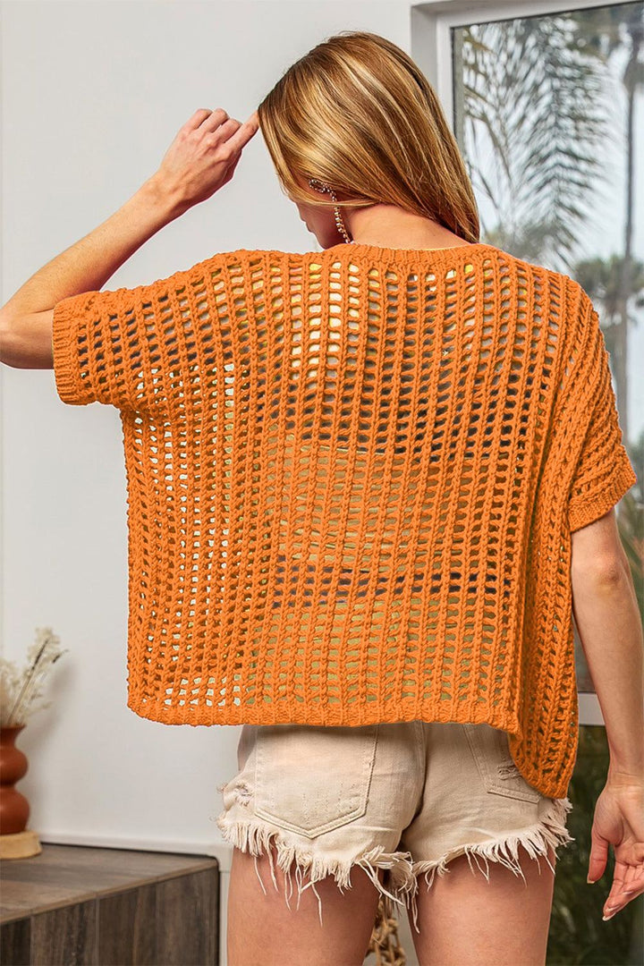 Openwork Knit TopStay stylish and chic with this 100% cotton Openwork Knit Top, perfect for layering over your outfits for a touch of elegance. The openwork design adds a trendy and Open Weave TopsOpenwork Knit Top