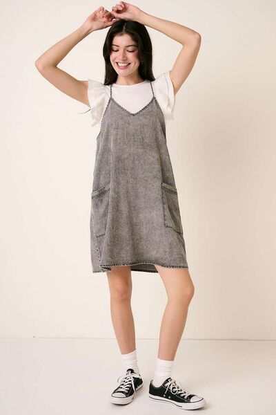 Washed Patch Pocket Mini Cami Denim DressThis washed patch pocket mini cami denim dress is a casual yet stylish addition to your wardrobe. The patch pockets add a touch of functionality and detail, while thMini DressesWashed Patch Pocket Mini Cami Denim Dress