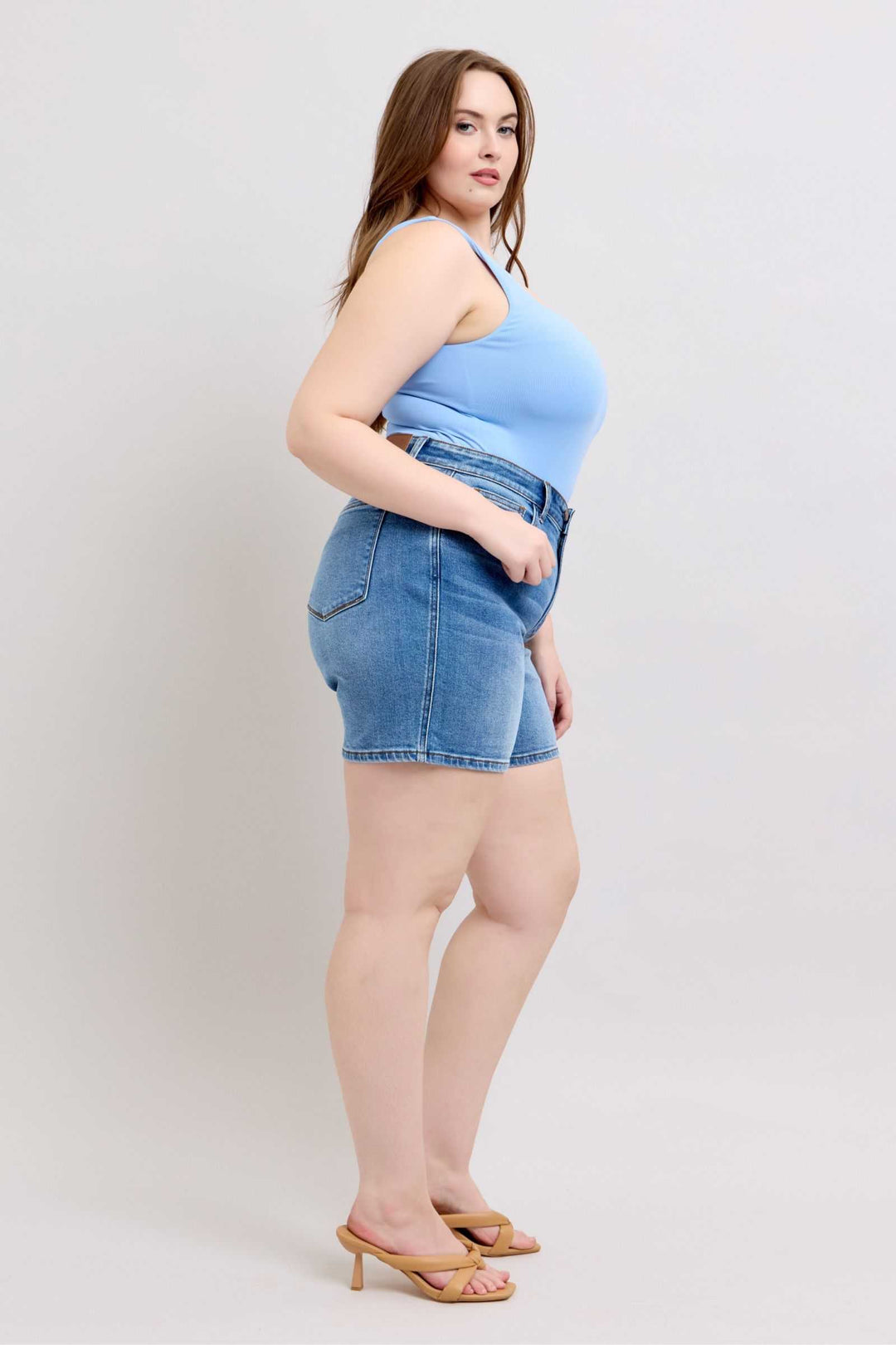 Judy Blue Two Button Denim ShortsElevate your casual look with our 2-button denim shorts featuring convenient pockets for on-the-go essentials. These shorts offer a stylish and comfortable fit, perfJean ShortsJudy Blue Two Button Denim Shorts