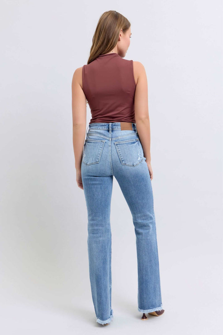Judy Blue Raw Hem High Rise Bootcut JeansRaw hem high rise bootcut jeans are a trendy and stylish denim option for a fashionable look. These jeans typically feature a high-rise waist that sits above the natBootcut JeansJudy Blue Raw Hem
