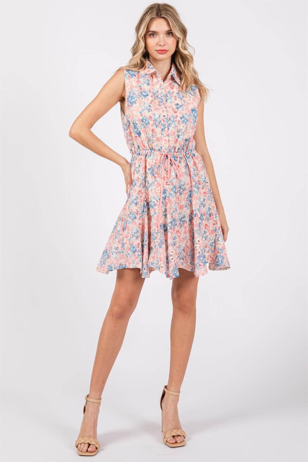 Floral Eyelet Sleeveless Mini DressThe Floral Eyelet Sleeveless Mini Dress is a charming and feminine choice for warm-weather occasions. Featuring delicate floral eyelet detailing, this dress exudes aMini DressesFloral Eyelet Sleeveless