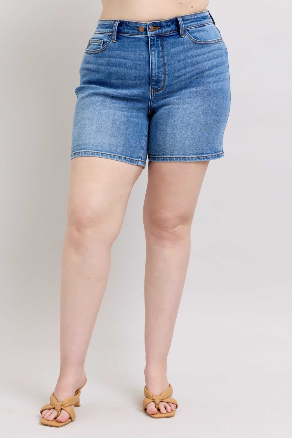 Judy Blue Two Button Denim ShortsElevate your casual look with our 2-button denim shorts featuring convenient pockets for on-the-go essentials. These shorts offer a stylish and comfortable fit, perfJean ShortsJudy Blue Two Button Denim Shorts