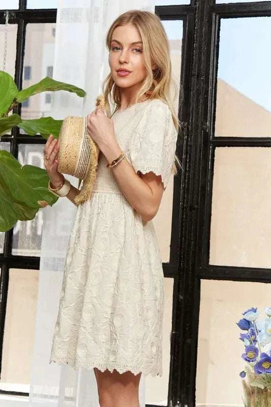 ADORA Rround Neck Crinkle Babydoll DressThe round neck crinkle babydoll dress is a charming and feminine option for any day. Its relaxed silhouette and crinkled texture add a playful touch to your outfit. ADORA Rround Neck