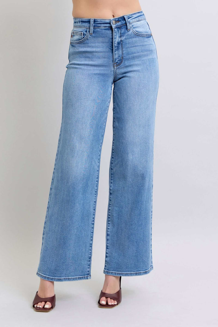 Judy Blue Wide Leg Jeans with PocketsWide Leg Jeans with Pockets are a trendy and versatile option for those looking to make a statement with their outfit. The wide-leg silhouette offers a relaxed and vWide Leg JeansJudy Blue Wide Leg Jeans