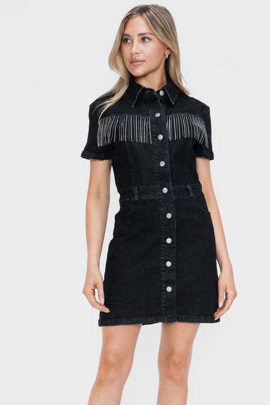 The Nashville Noir DressA little bit country, a little bit rock ‘n’ roll—the Nashville Noir Dress is where western edge meets modern glam. This sleek black denim shirt dress features a tailMini DressesNashville Noir Dress