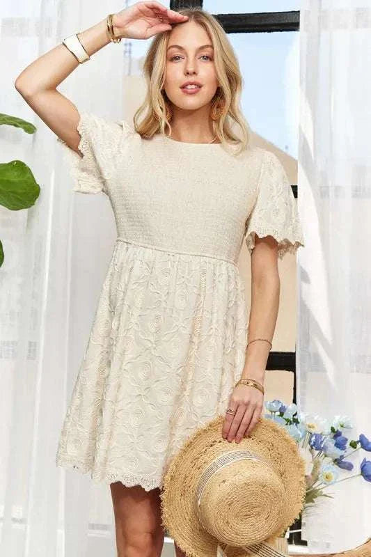 ADORA Rround Neck Crinkle Babydoll DressThe round neck crinkle babydoll dress is a charming and feminine option for any day. Its relaxed silhouette and crinkled texture add a playful touch to your outfit. ADORA Rround Neck