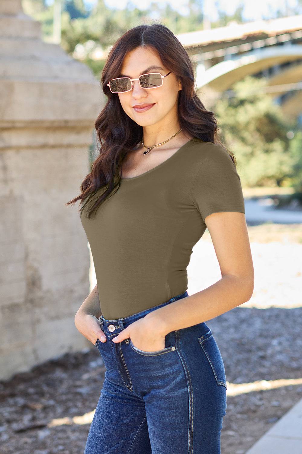Round Neck Short Sleeve BodysuitBrand: Basic Bae 
Fit: True to size
Features: Basic style
Sheer: Opaque
Stretch: Moderate stretch
Material composition: 95% rayon, 5% spandex
Care instructions: MachBodysuitsRound Neck Short Sleeve Bodysuit