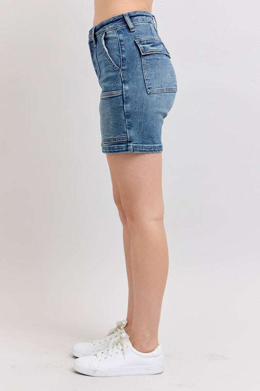 Judy Blue High Rise Denim ShortsHigh Rise Denim Shorts are a versatile and classic wardrobe staple that offer a stylish and flattering silhouette. These shorts sit at or above the natural waistlineJean ShortsJudy Blue High Rise Denim Shorts