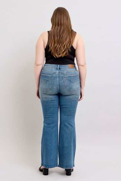 Judy Blue Flared Tummy Control Vintage Wash Flare JeansThese flared tummy control vintage wash jeans offer both style and functionality. The tummy control feature helps create a flattering and slimming silhouette. The viFlare JeansJudy Blue Flared Tummy Control
