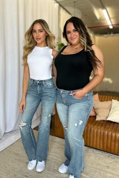 Judy Blue Medium Rise Tummy Control Destroyed FlareThe medium rise tummy control destroy flare jeans are designed to enhance your silhouette while providing ultimate comfort. Featuring a flattering fit, these jeans oFlare JeansJudy Blue Medium Rise