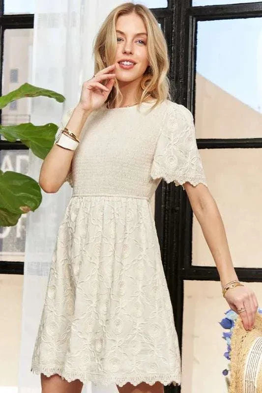 ADORA Rround Neck Crinkle Babydoll DressThe round neck crinkle babydoll dress is a charming and feminine option for any day. Its relaxed silhouette and crinkled texture add a playful touch to your outfit. ADORA Rround Neck