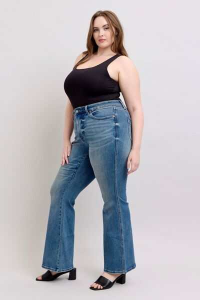 Judy Blue Flared Tummy Control Vintage Wash Flare JeansThese flared tummy control vintage wash jeans offer both style and functionality. The tummy control feature helps create a flattering and slimming silhouette. The viFlare JeansJudy Blue Flared Tummy Control