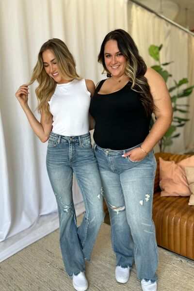 Judy Blue Medium Rise Tummy Control Destroyed FlareThe medium rise tummy control destroy flare jeans are designed to enhance your silhouette while providing ultimate comfort. Featuring a flattering fit, these jeans oFlare JeansJudy Blue Medium Rise