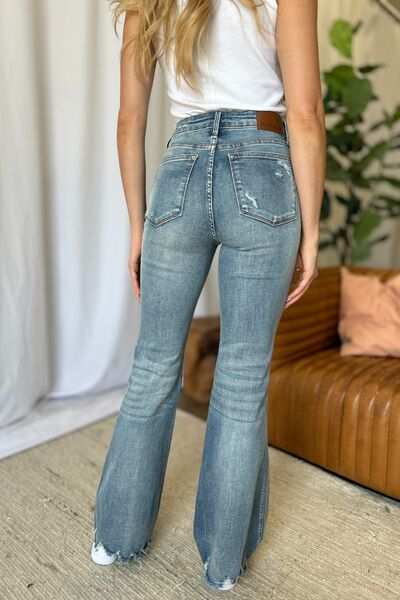 Judy Blue Medium Rise Tummy Control Destroyed FlareThe medium rise tummy control destroy flare jeans are designed to enhance your silhouette while providing ultimate comfort. Featuring a flattering fit, these jeans oFlare JeansJudy Blue Medium Rise