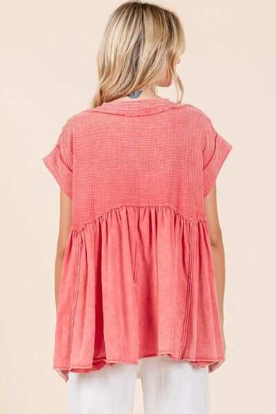 Mineral Wash Cotton Babydoll Short Sleeve BlouseThis relaxed fit tunic top is crafted from a unique 100% cotton waffle knit fabric with a mineral wash finish for a laid-back and stylish look. Featuring a flatterinShort Sleeve BlousesMineral Wash Cotton