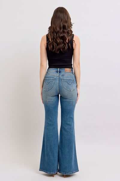 Judy Blue Flared Tummy Control Vintage Wash Flare JeansThese flared tummy control vintage wash jeans offer both style and functionality. The tummy control feature helps create a flattering and slimming silhouette. The viFlare JeansJudy Blue Flared Tummy Control