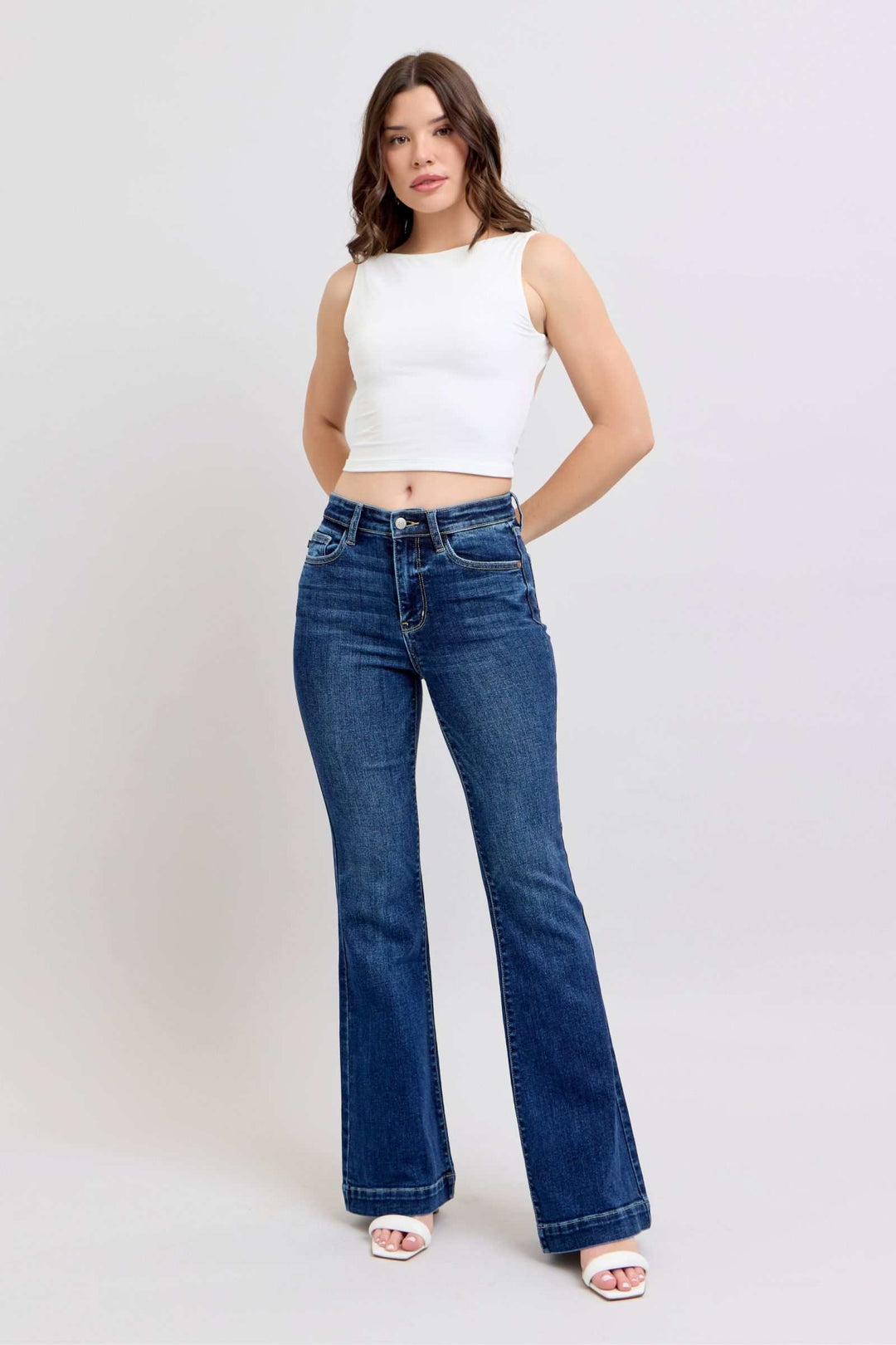 Judy Blue High Rise Flare Jeans with PocketsHigh-rise flare jeans with pockets are a trendy and versatile wardrobe staple. They provide a flattering high-waisted silhouette and the flare leg adds a chic retro Flare JeansJudy Blue High Rise Flare Jeans