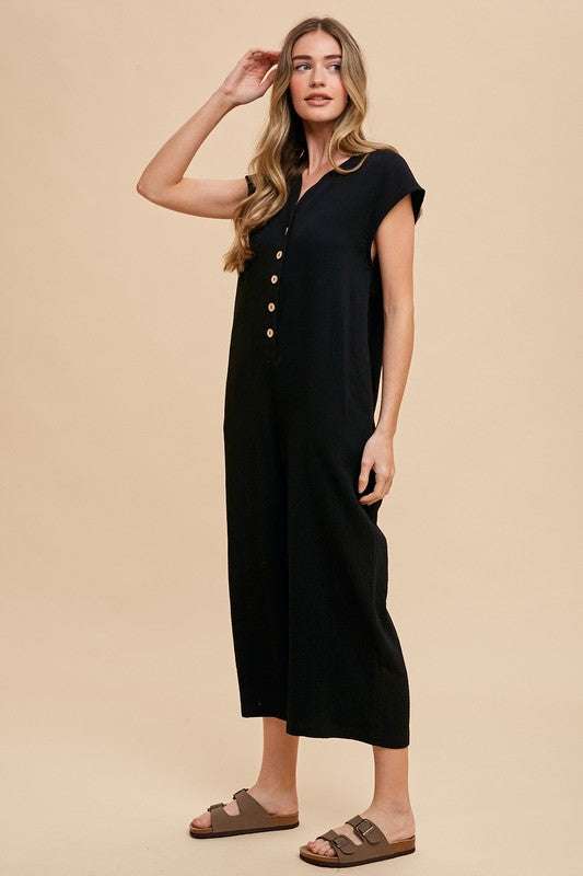 Cotton Wide Leg JumpsuitThe Cotton Wide Leg Jumpsuit with Pockets is a stylish and versatile garment that offers both comfort and chic style. This jumpsuit features button detailing that adJumpsuitsCotton Wide Leg Jumpsuit