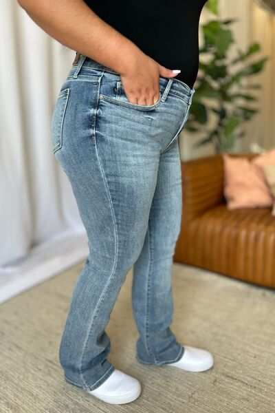 Judy Blue Medium Rise Bootcut JeansThe medium rise bootcut jeans are a timeless wardrobe staple that flatters all body types. Designed with a comfortable fit, they sit perfectly at the waist while offBootcut JeansJudy Blue Medium Rise Bootcut Jeans