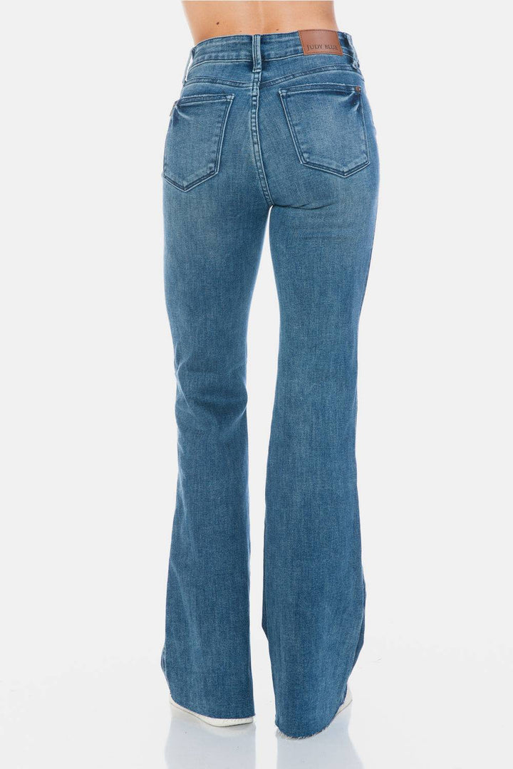 Judy Blue Tummy Control Vintage Wash Cut Hem Flare JeansThe Tummy Control Vintage Wash Cut Hem Flare is a stylish and flattering pair of jeans. With its tummy control feature, it helps create a streamlined silhouette. TheFlare JeansJudy Blue Tummy Control