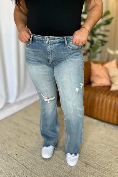 Judy Blue Medium Rise Tummy Control Destroyed FlareThe medium rise tummy control destroy flare jeans are designed to enhance your silhouette while providing ultimate comfort. Featuring a flattering fit, these jeans oFlare JeansJudy Blue Medium Rise
