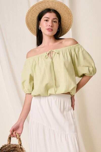 Cotton Two-Way Short Sleeve Cropped BlouseThe Cotton Two-Way Short Sleeve Crop Blouse is a versatile and chic piece that offers multiple styling options. Made from lightweight cotton fabric, this blouse is pShort Sleeve BlousesCotton Two-Way Short Sleeve