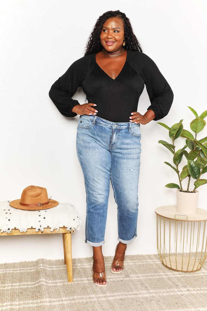 V- Neck Long Sleeve BodysuitThis bodysuit seamlessly merges romantic allure with contemporary flair. The poet sleeves, with their billowing and slightly puffed structure, infuse a sense of dramBodysuitsV- Neck Long Sleeve Bodysuit