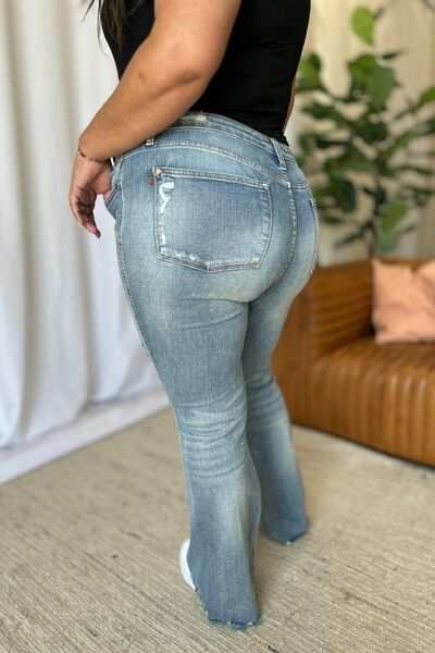 Judy Blue Medium Rise Tummy Control Destroyed FlareThe medium rise tummy control destroy flare jeans are designed to enhance your silhouette while providing ultimate comfort. Featuring a flattering fit, these jeans oFlare JeansJudy Blue Medium Rise