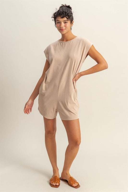 Relaxed Fit Breezy RomperThe Round Neck Cap Sleeve Relaxed Fit Breezy Romper is a stylish and comfortable one-piece outfit perfect for warm weather. Featuring a round neck and cap sleeves, tRompersRelaxed Fit Breezy Romper