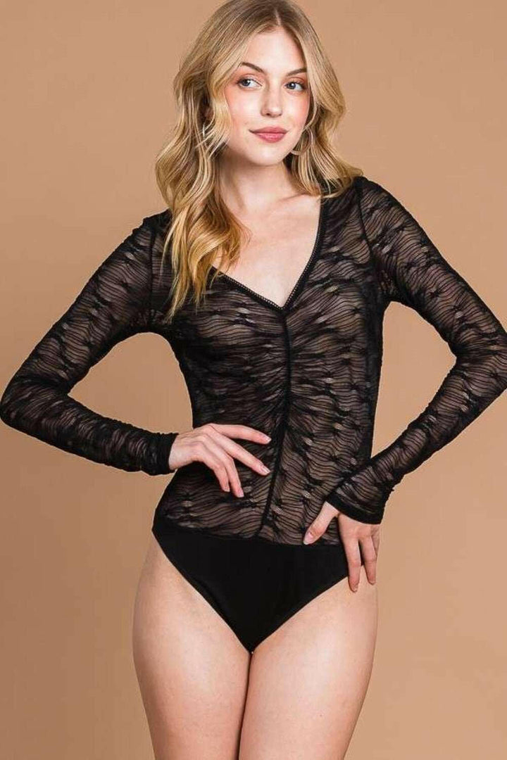 'Mesh Perspective' Sheer BodysuitThe V-Neck Mesh Perspective Sheer Bodysuit is a stunning and seductive addition to your wardrobe. Made with sheer mesh fabric, this bodysuit exudes a sense of allureBodysuitsMesh Perspective Sheer Bodysuit