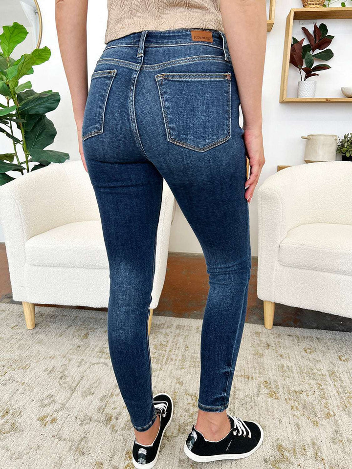 Judy Blue Classic Handsand Skinny JeansClassic Handsand Skinny Jeans combine timeless style with a trendy, hand-sanded finish for a versatile and fashion-forward look. The handsanding technique adds a touSkinny JeansJudy Blue Classic Handsand Skinny Jeans