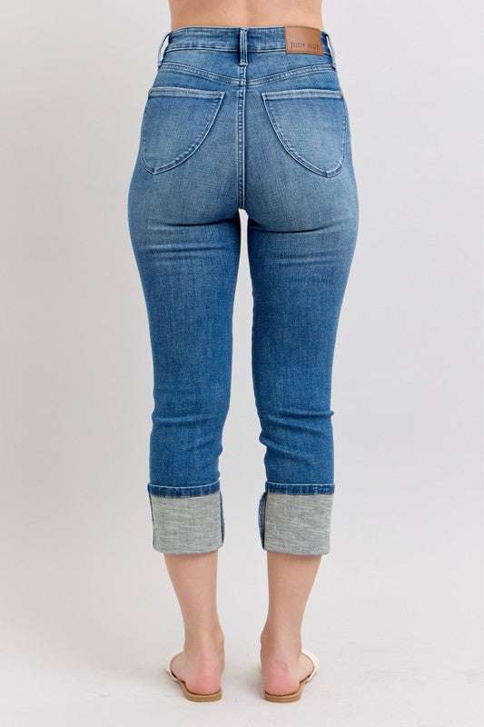 Judy Blue Skinny Cuff Capris JeansSkinny cuff capris jeans are a trendy style of jeans that are fitted through the legs and end in a cuffed hem. They are a great option for a casual and chic look, peCropped JeansJudy Blue Skinny Cuff Capris Jeans