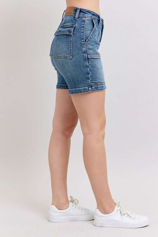 Judy Blue High Rise Denim ShortsHigh Rise Denim Shorts are a versatile and classic wardrobe staple that offer a stylish and flattering silhouette. These shorts sit at or above the natural waistlineJean ShortsJudy Blue High Rise Denim Shorts