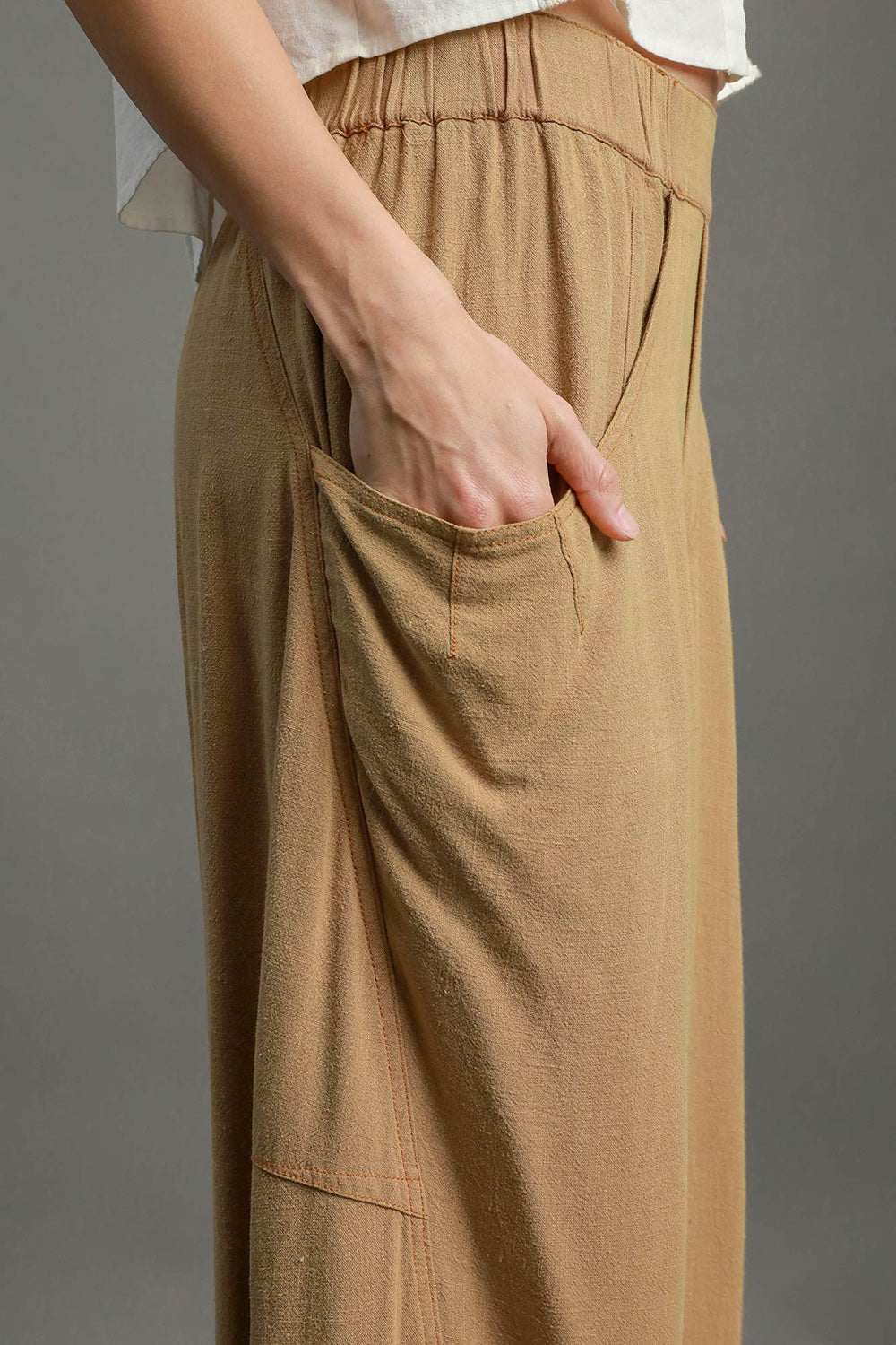 The Sandbar Linen Blend TrousersEasy, breathable, and softly structured — The [NAME] Trousers are crafted from a natural linen-cotton blend that moves effortlessly through warm days and cooler evenPantsSandbar Linen Blend