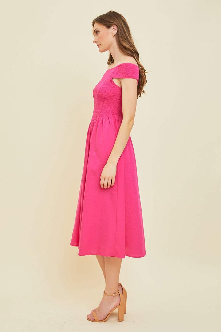 Off-Shoulder Smocked Midi DressThe 100% cotton Off-Shoulder Smocked Midi Dress is a stylish and versatile piece that is perfect for warm weather. Featuring an off-shoulder design and a smocked bodMidi DressesOff-Shoulder Smocked Midi Dress