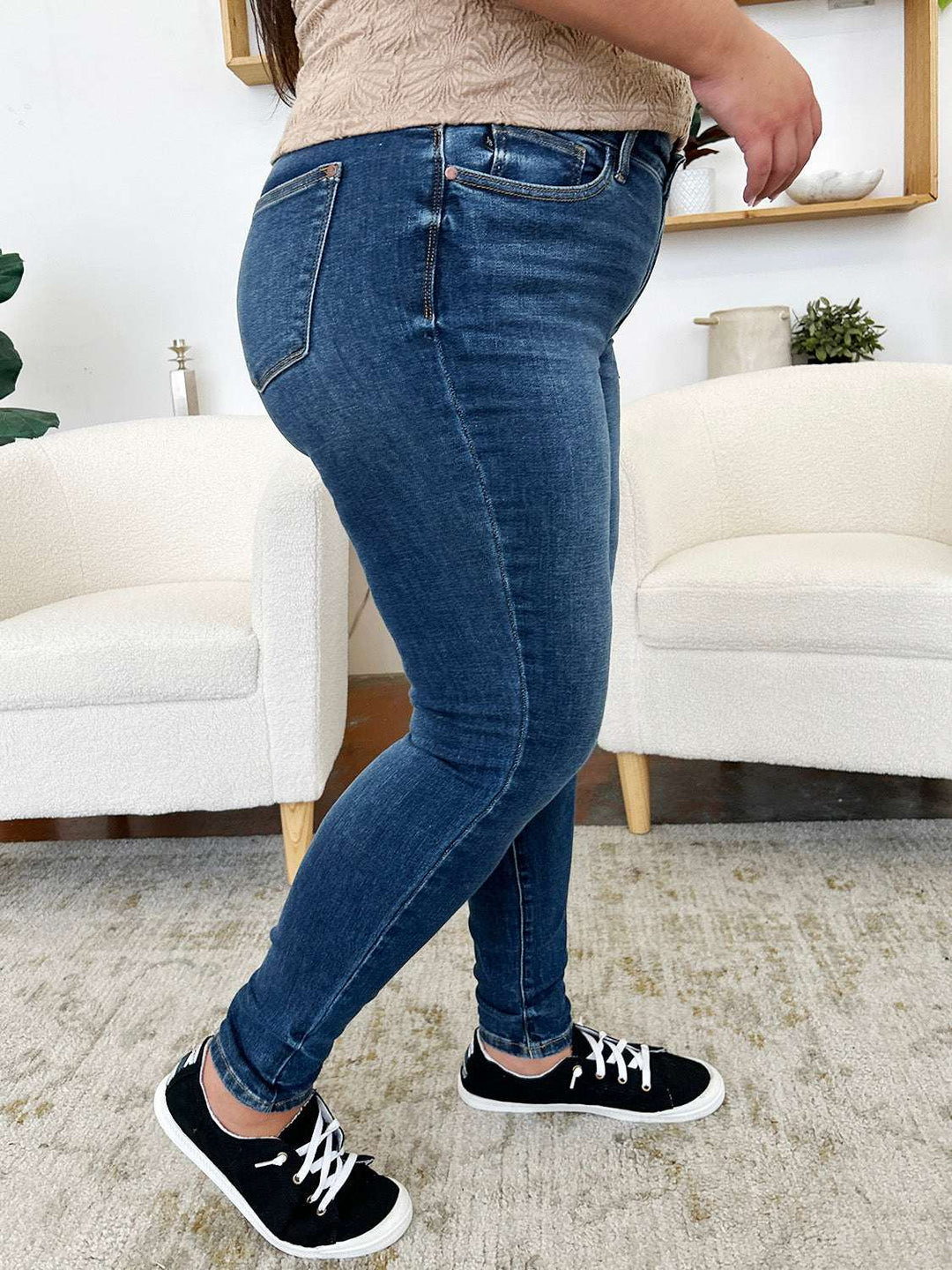 Judy Blue Classic Handsand Skinny JeansClassic Handsand Skinny Jeans combine timeless style with a trendy, hand-sanded finish for a versatile and fashion-forward look. The handsanding technique adds a touSkinny JeansJudy Blue Classic Handsand Skinny Jeans