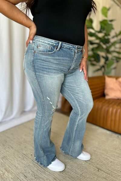 Judy Blue Medium Rise Tummy Control Destroyed FlareThe medium rise tummy control destroy flare jeans are designed to enhance your silhouette while providing ultimate comfort. Featuring a flattering fit, these jeans oFlare JeansJudy Blue Medium Rise