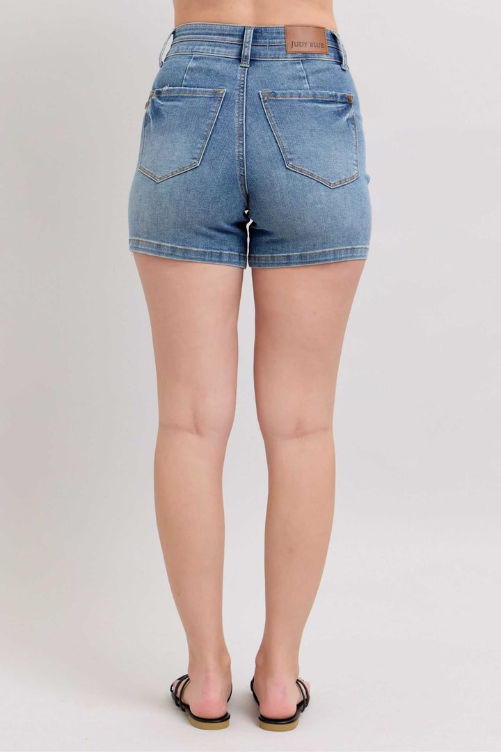 Judy Blue High Rise Tummy Control Denim ShortsHigh Rise Tummy Control Denim Shorts are a fashionable and flattering option for those looking for a slimming and comfortable fit. These shorts feature a high-rise wJean ShortsJudy Blue High Rise