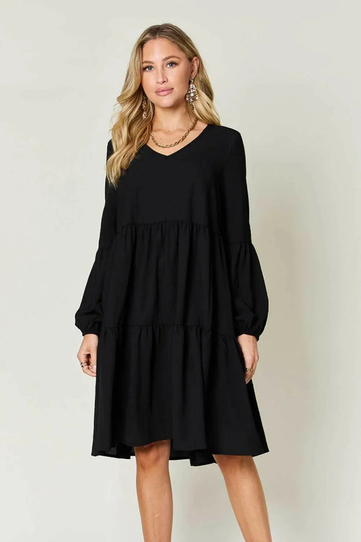 Effortless Elegance Tiered DressExclusivity statementDiscover the unmatched charm of the Effortless Elegance Tiered Dress, a chic mini dress designed exclusively for those who appreciate refined stMini DressesEffortless Elegance Tiered Dress