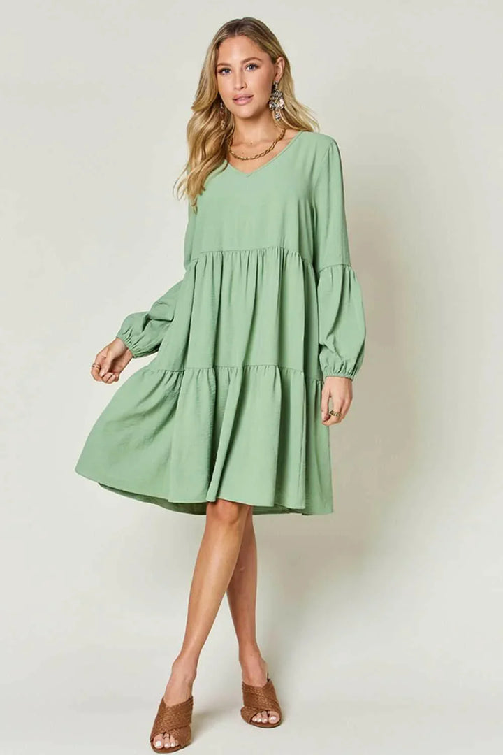 Effortless Elegance Tiered DressExclusivity statementDiscover the unmatched charm of the Effortless Elegance Tiered Dress, a chic mini dress designed exclusively for those who appreciate refined stMini DressesEffortless Elegance Tiered Dress